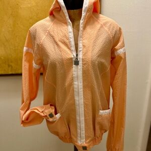 CHANEL Peach Textured Jacket with White Zipper